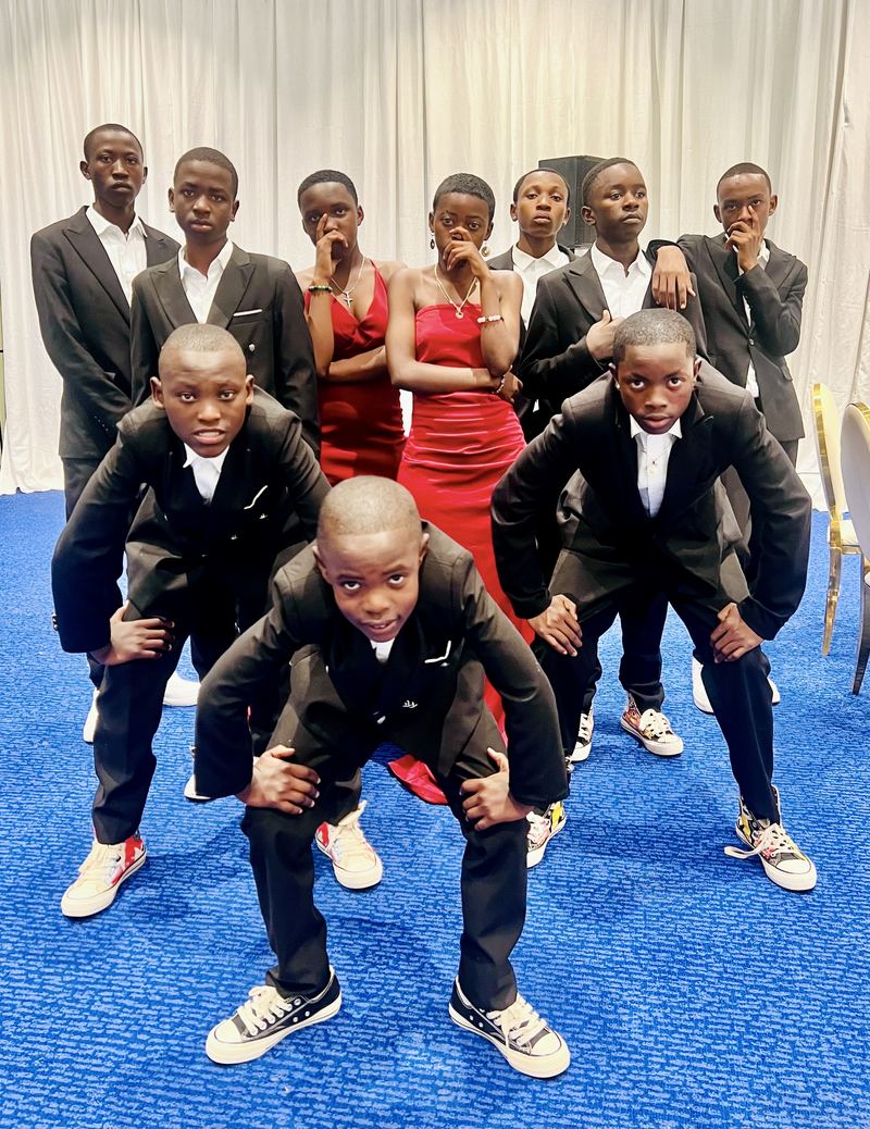 The CCF crew dressed sharp in black suits before a show.